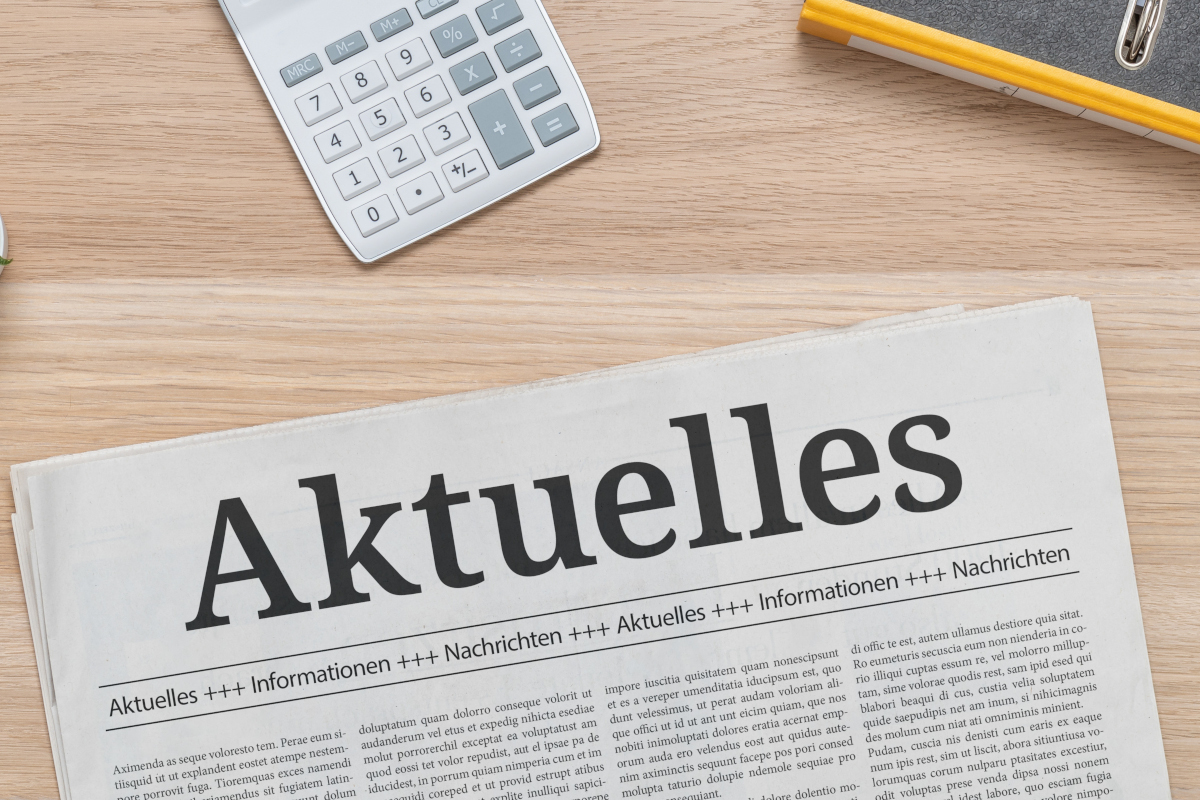 Demobild News und Taschenrechner